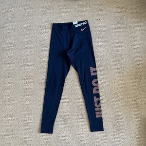 Nike just do it leggings. Size small. Navy with copper writing.